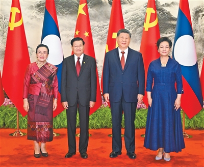 习近平同老挝人民革命党中央总书记、国家主席通伦举行会谈.jpg