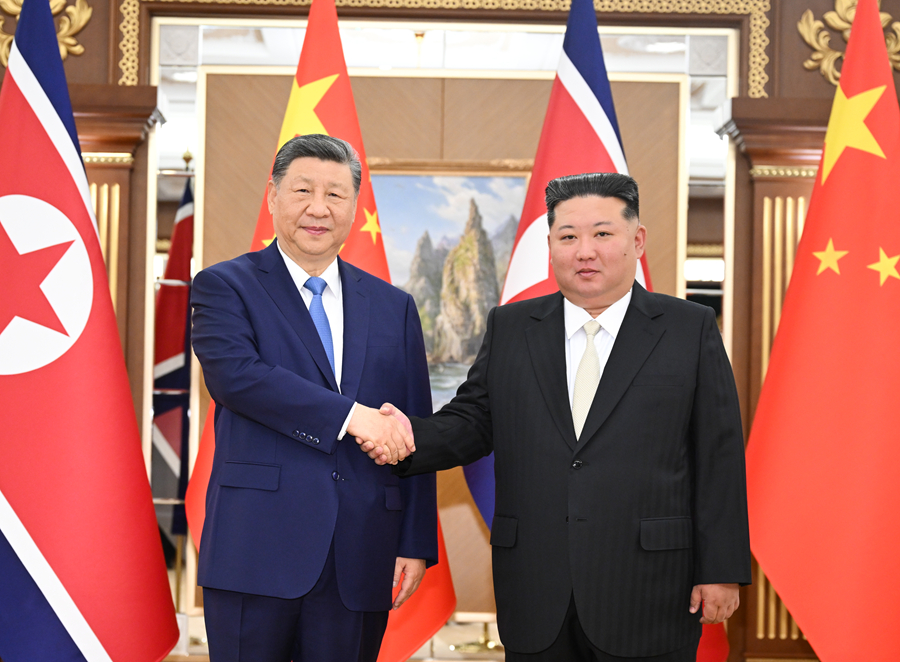 习近平同金正恩举行会谈.jpg